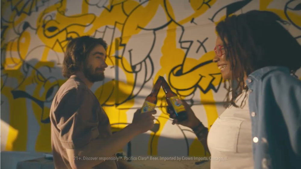 people cheerings Pacifico beer