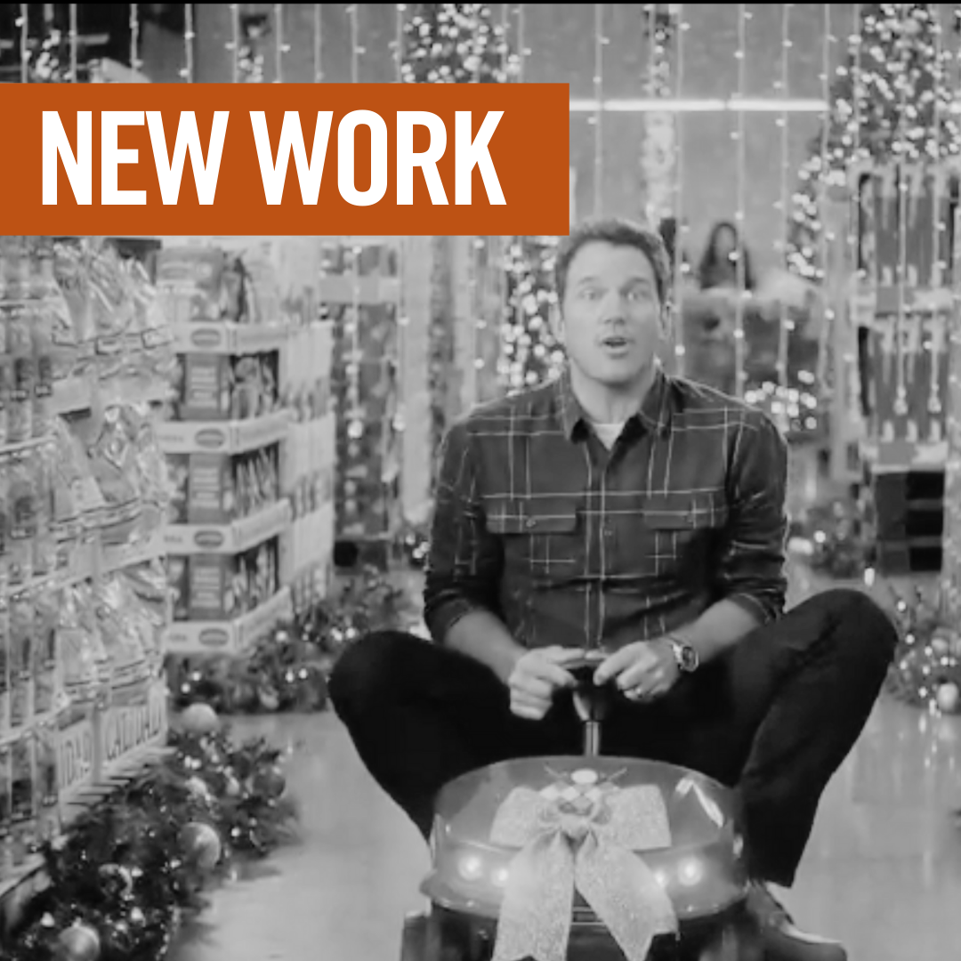 chris pratt riding on a toy car