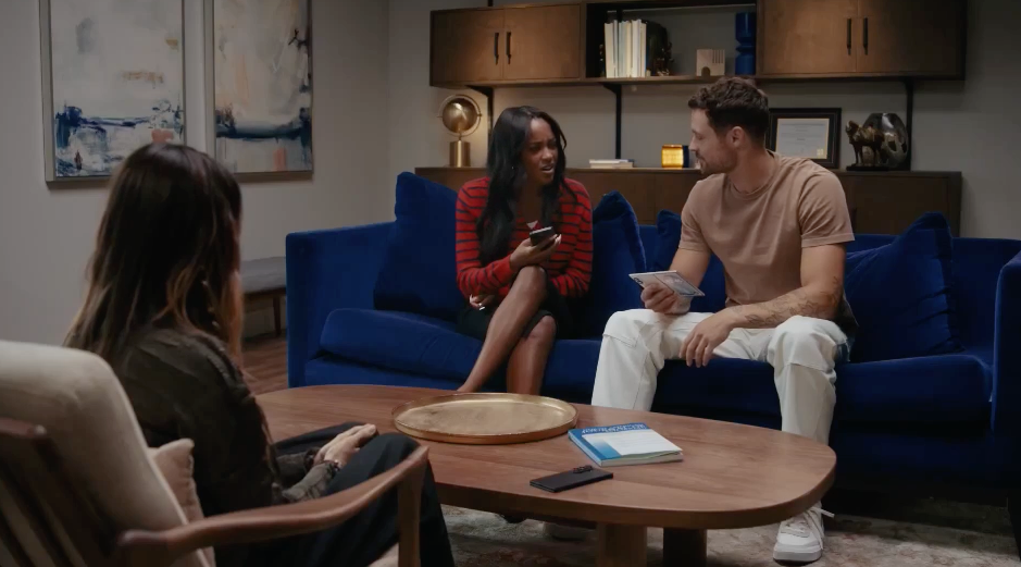 people on blue couch